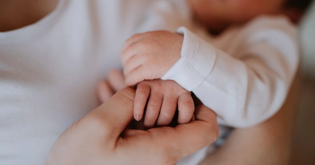 The measles outbreak is “slowing.” A newborn’s family still can’t meet her. The measles outbreak is “slowing.” A newborn’s family still can’t meet her.